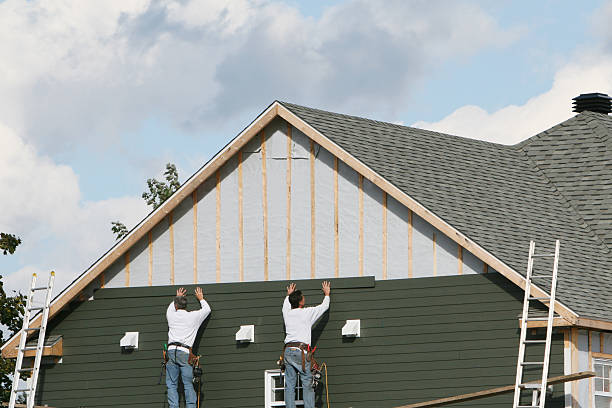 Professional Siding Replacement technician working in Manor, PA